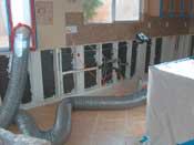 Open up all affected areas, scrape off mold, then treat with a disinfectant like Foster's 40-80. Rent a negative air machine to properly evacuate air to the outside.