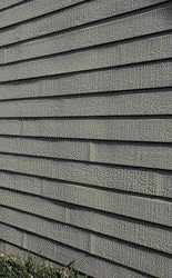 Caulk is usually used with fiber-cement siding to prevent water intrusion at the butt joints. However, this detail may not be effective at sealing the ends, allowing water to be absorbed and swell the board ends.
