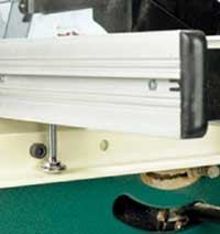 The fence on the Grizzly has a support glide that rides on the rear fence rail, providing smooth adjustment.