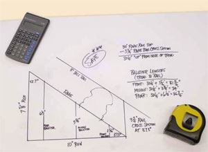 The author draws a full-scale triangle to match the rise and run of the stair he's building.