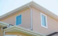 The casings installed over EIFS on the front side of this house will improve its resale appeal.