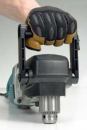 Front handles with generous hand clearance, like on this Makita, are preferred. To reduce the profile height, such handles can be rotated forward.