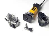 The DeWalt kit ships as a full-on laminate trimmer, complete with angled base, edge guide, and offset base.
