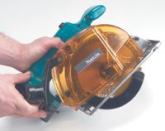 Makita's chip collector contains most of the cutting   debris and is easy to empty.