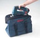 Instead of a hard plastic box, Bosch provides a wide-mouth canvas bag to transport its cordless jigsaw and supplies.