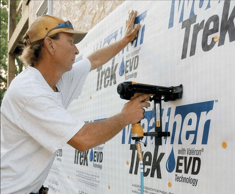 Cap nails are as easy to install as narrow crown staples but provide much more holding power. This holding power is not trivial. It’s needed to keep the weather barrier intact before the cladding gets installed, particularly where persistent ocean breezes provide a constant risk of ripping housewrap to shreds.