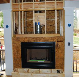 Figure 1. So-called zero-clearance fireplaces do in fact require some clearance to combustibles but so little that wood-framed chases are typical.