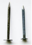 Both the cement-coated smooth-shank drywall nail (far left) and the blued ring-shank drywall nail (left) meet code requirements, but they’re more likely to pop than a drywall screw.