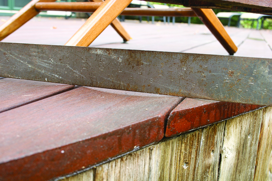 Differences in moisture content between their tops and bottoms has caused these boards to cup.