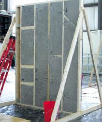 The weatherizing crew that worked on this wall section achieved excellent density and found most of the cavities, including the one defined by the hidden diagonal brace at upper right. Unfortunately, they completely missed the narrow stud bay at far left - an omission that would significantly reduce the final R-value of a real-world wall assembly.