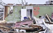 The wreckage of this home, in the aftermath of a tornado that struck Tuscaloosa, Ala., on April 27, demonstrates the tendency of some interior rooms to remain largely intact even when the rest of a structure has been demolished.