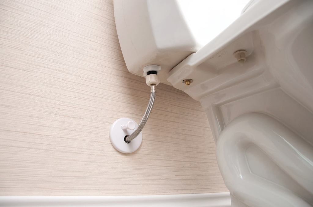 Simply crimp or solder the water supply to a rough-in unit that has an integral brass valve, then screw the box to a stud and snap on the trim kit.