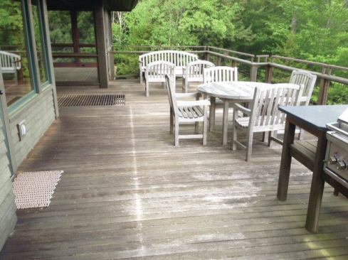 Located in the heart of Vermont’s Green Mountains, this slope-side ipe deck hadn’t been maintained since its installation 14 years ago. Note the drip line underneath the eaves.