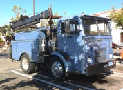 A cab over engine (COE) vehicle has a flat front and the cab and engine sit over the front axle—a design that allows for a shorter truck.