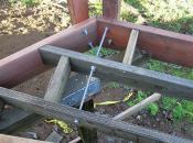 Reinforcing the post with threaded rod adds stability. The washers and nuts on both sides of the framing members that the rod passes through make it possible to plumb up the posts perfectly.