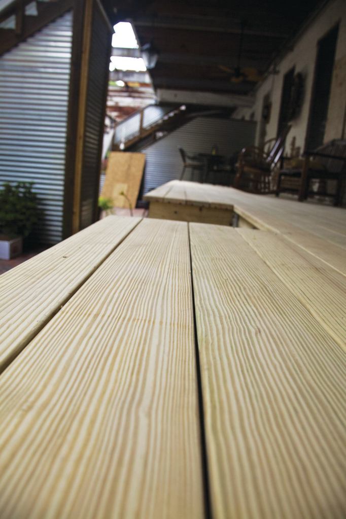 Not all treated southern yellow pine has clear vertical grain like this, of course, but your PT decking will look better if you run it lightly through a power planer to remove grade marks prior to installation.