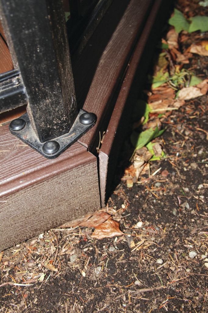 Though installed following the manufacturer’s recommendations, the composite fascia trim on this deck is pulling away from the framing in several locations, including this mitered corner.