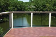 Fortress vertical stainless steel cable railing panels are shown on a deck built by Peachtree Decks and Porches, in Georgia.