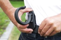 Slide-Kick hose and cord holder