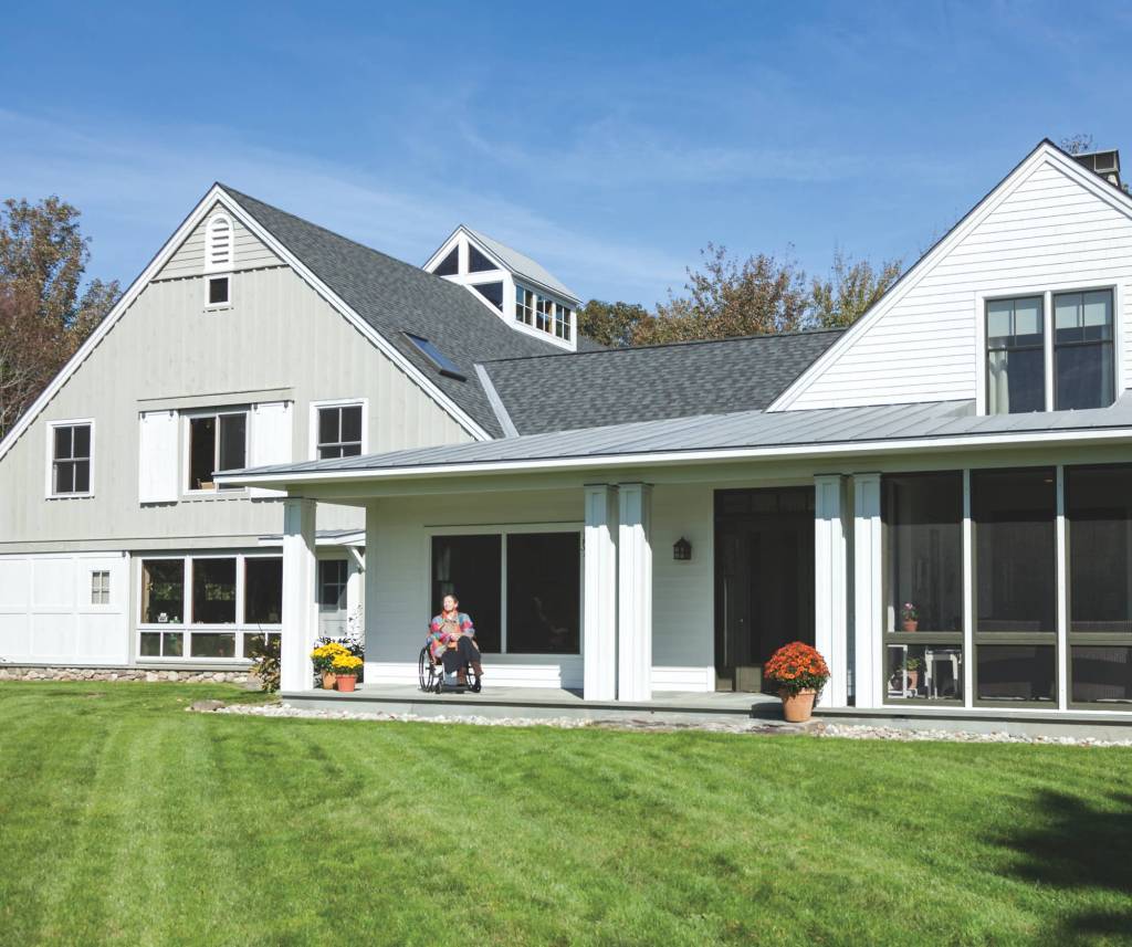 Siting the building close to grade creates a strong connection to the landscape. A no-step entry at the house’s driveway side provides wheelchair access.