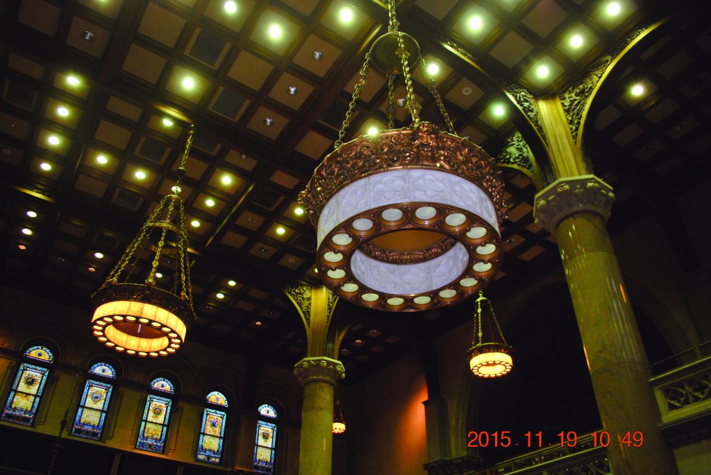 The antique chandelier (circa 1913) was ornate and very heavy (estimated weight of one to two tons with its translucent alabaster and brass construction).
