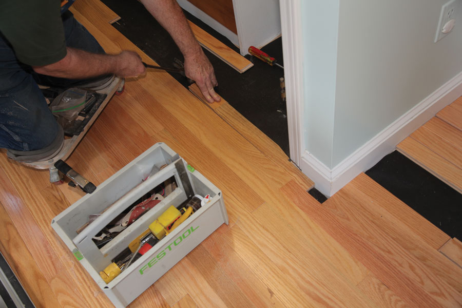 Proper moisture content in wood flooring and in the subfloor, along with adequate nailing, lets the flooring be installed without an expansion space.