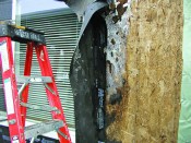 In cold climates, interior moisture can condense and saturate the sheathing from inside. Wide, impermeable flashing inhibits the drying that usually happens in the warmer months, and the wet sheathing is prone to rot. This photo shows a clear line between the rotted sheathing that was covered with flashing, and the sound sheathing that was able to dry properly.