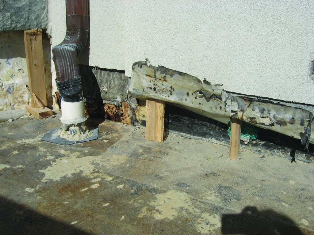 Doug Horgan's photo from “Repairing a Stone Patio Over a Living Space” (Jul/16) shows aluminum flashing that has deteriorated after being in contact with a concrete surface.