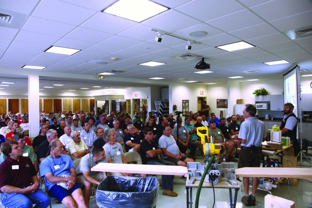 Gary Katz speaks to a group of more than 100 contractors on Cape Cod, stressing the importance of taking pride in one’s work to garner respect from clients and the community.