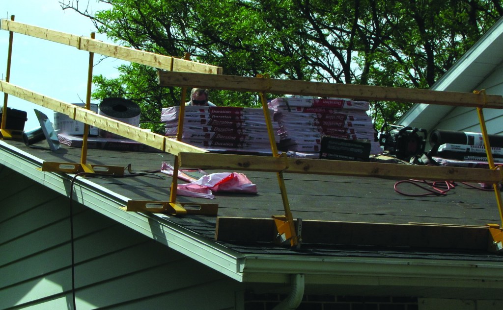 Code requires roofs to be built strong enough to carry more than just their own weight including live loads such as  the weight of workers and stacked up materials concentrated in small areas.
