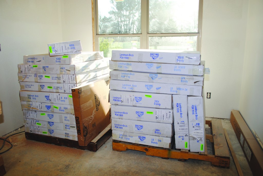 An RTA kitchen arrives on pallets.