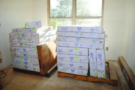 An RTA kitchen arrives on pallets.