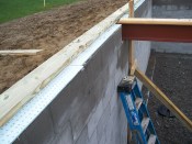 Where foundations meet floor framing, seal sealer alone isn’t enough: Builders need to carefully address the band joist area also.