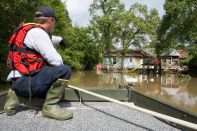 Regional Response Team Six conduct search and rescue operations by boat in Ascension Parish (photo courtesy FEMA).