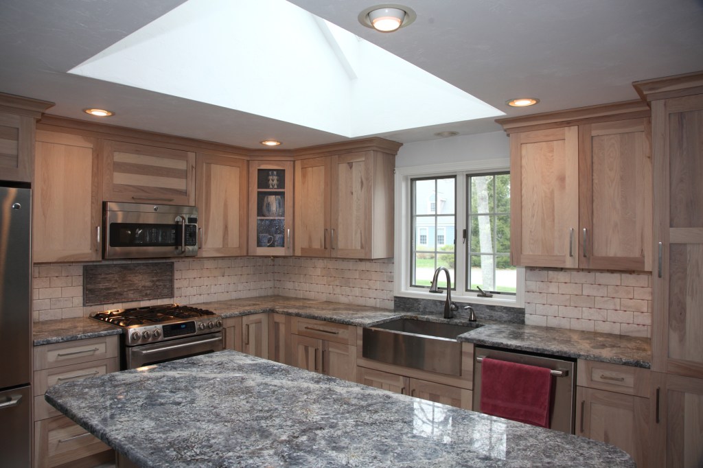 A tiled backsplash not only dresses up this kitchen, it also provides a surface behind work areas that is easy to clean and maintain.