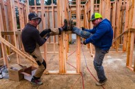 The Helly Hansen and Björnkläder construction pants are way more flexible than these two guys are.