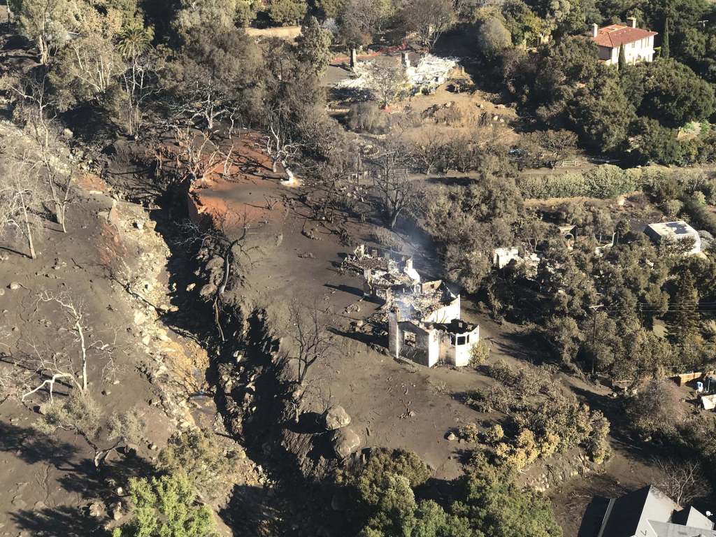 A California Air National Guard HH-60G Pave Hawk rescue helicopter with air crews and two Guardian Angel pararescuemen from the 129th Rescue Wing Moffett Air National Guard Base, Calif, provide search and rescue operations after Southern California mudslides, Jan. 10, 2018. (U.S. Air National Guard photo by Staff Sgt. Cristian Meyers)