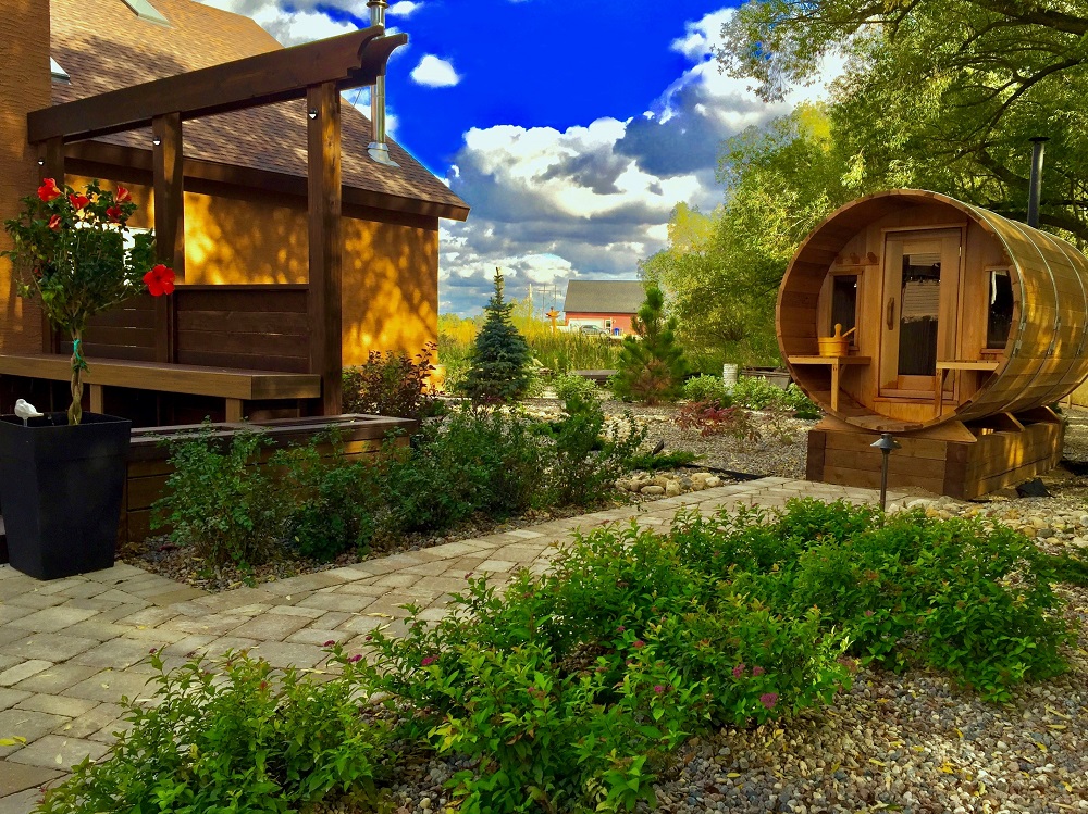 Located a few steps away from the poolhouse deck, this prefabricated wood-fired barrel sauna is just one of the many features that make up the large outdoor living project that came to be known as "the Behemoth."