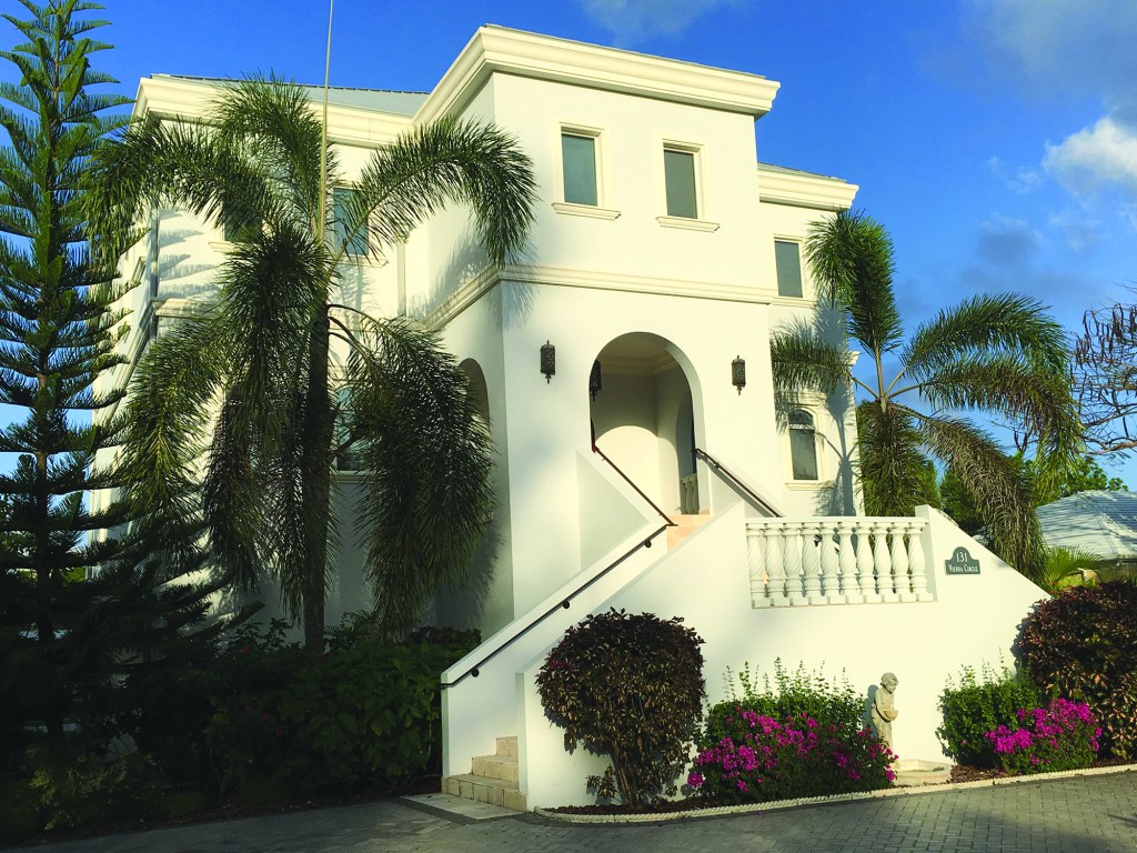 This Cayman Islands custom home, constructed with insulating concrete forms (ICFs), used waste heat from the air conditioning to heat the pool for free