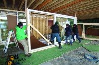 The doors weighed about 750 pounds apiece without the slider, and more like 950 pounds with it.