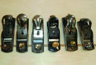 The author has acquired a collection of used block planes over the course of his carpentry career. All required a tune-up and sharpening, but none cost more than $25.