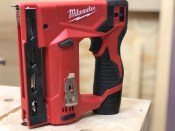 The Milwaukee cordless stapler weighs about 3 pounds with a 1.5Ah battery. The belt hook is reversible; rubber bumpers on the sides help protect finished surfaces when the stapler is placed on the side opposite the belt hook.