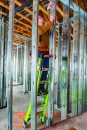 The King Kombo 3-in-1 ladder has an adjustable pad for holding on corners or studs. It meets Type 1AA standards and is rated at 375 pounds in all configurations.