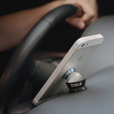 Nite Ize Steelie parts mount to the phone and the dash with 3M VHB adhesive.