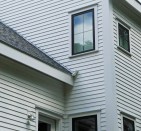 A properly installed kickout diverts roof water away from siding at a roof-to-wall  intersection. (Photo by Mike Guertin.)
