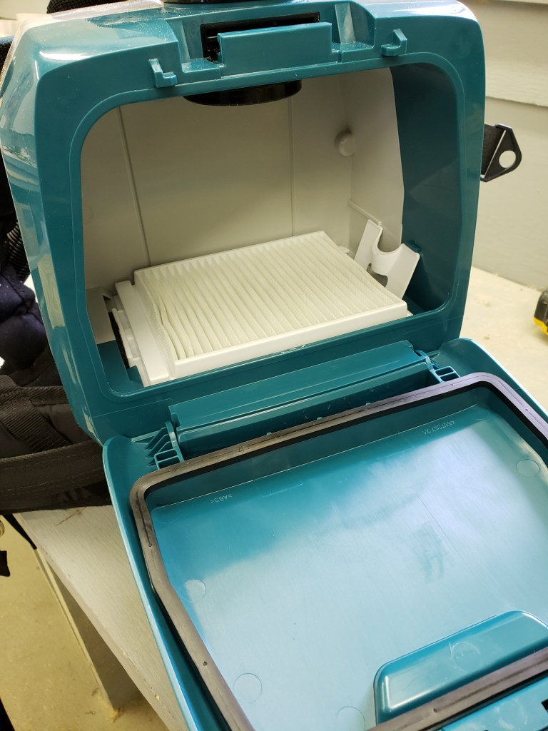 The unit ships with disposable dust bag and HEPA filter. Reusable dust bags are available.