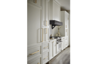 Cabinet pulls of various sizes from the Davenport series in the Ellis hardware collection, shown here in a Honey Bronze finish.