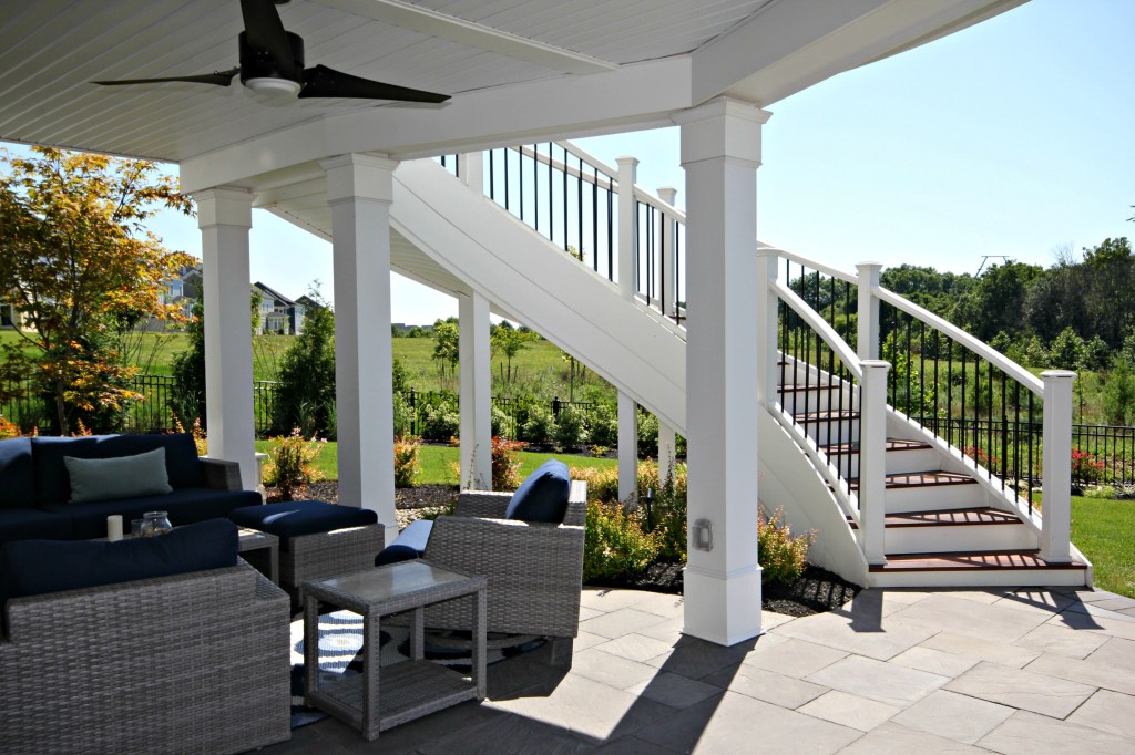 Optimize outdoor living space with the Trex RainEscape deck drainage system.