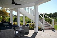 Optimize outdoor living space with the Trex RainEscape deck drainage system.