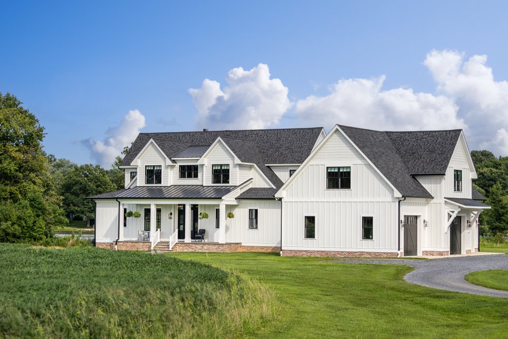 Farmhouse Plan 928-373 Front Exterior at Houseplans.com. Photo by Ashley Avila.